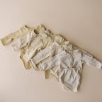 Terry Front flap Onesie | Buttercream