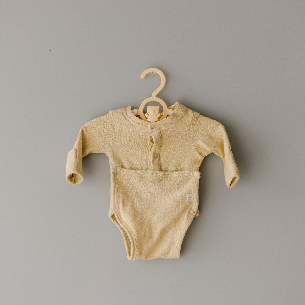 Terry Front flap Onesie | Buttercream